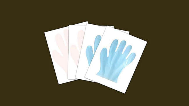 Máquina para fabricar guantes desechables de papel para uso médico o de peluquería