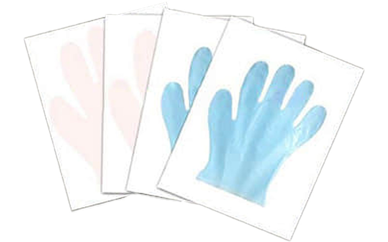 Máquina para fabricar guantes desechables de papel para uso médico o de peluquería