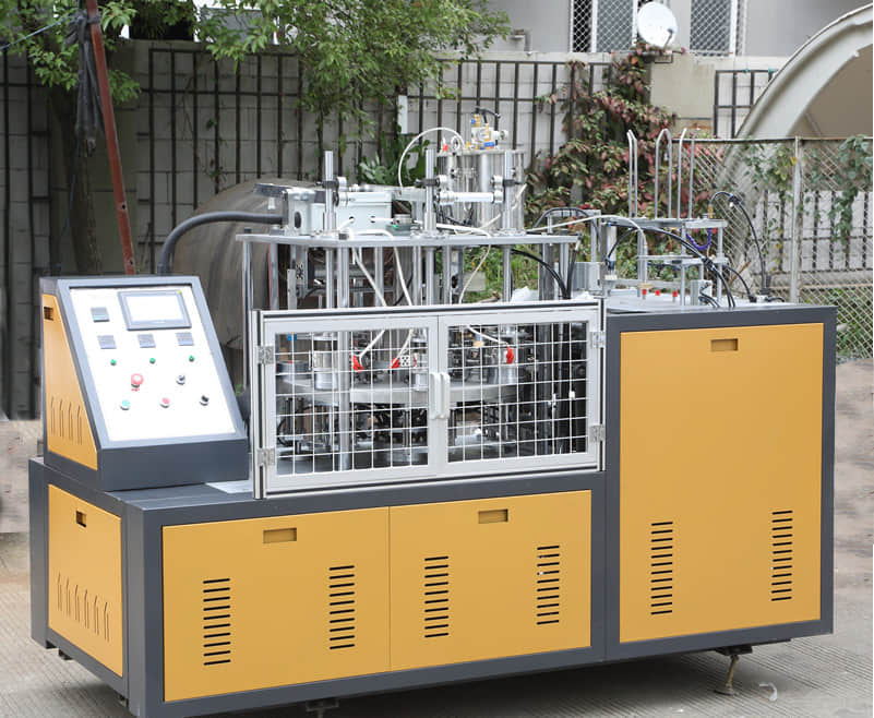 Máquina automática para hacer panettone redondo con moldes de papel para hornear magdalenas