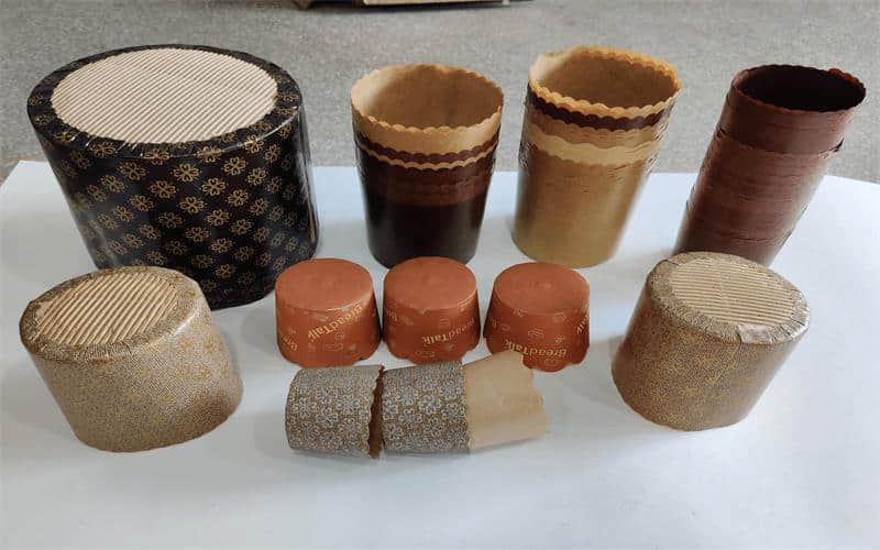 Máquina automática para hacer panettone redondo con moldes de papel para hornear magdalenas